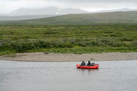 A bright raft along a river